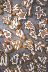 Vanilla cookies on white baking paper sheet.