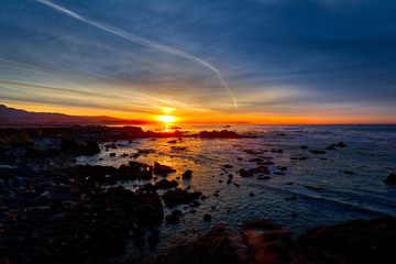 Fototapeta na wymiar Sunrise at a beach along the Pacific Coast Highway