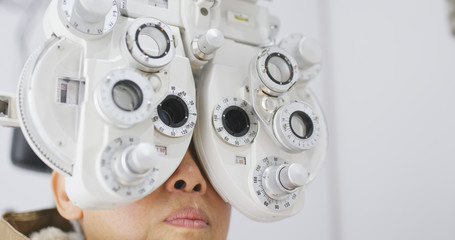 Senior woman undergo eye test
