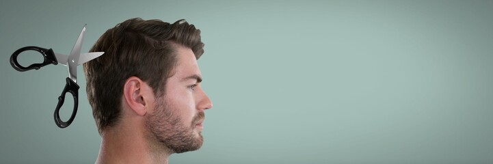 Obraz premium Scissors cutting man's hair