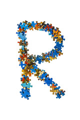 Letter R made of puzzle pieces
