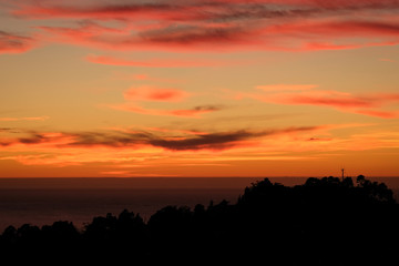 Fototapeta na wymiar Dramatic sunset on San Francisco hills