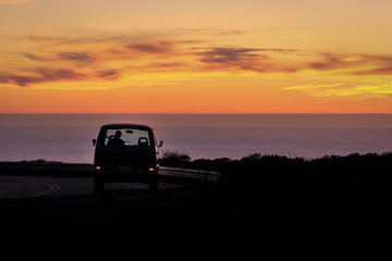 Fototapeta na wymiar Scenic road at the sunset