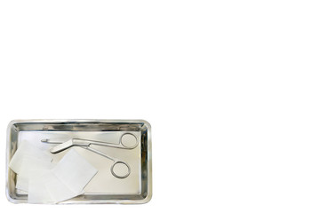 dressing wound set ,scissors ,pad gauze,tray bird eye view on white background with copy text space
