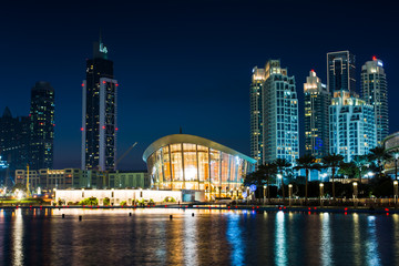 Naklejka premium Dubai modern buildings reflected in the water