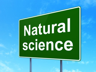 Science concept: Natural Science on green road highway sign, clear blue sky background, 3D rendering