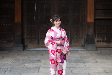 Attractive asian woman wearing kimono at Asakusa, Tokyo, Japan