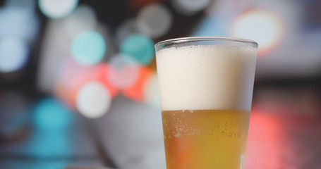 Pouring beer into glass