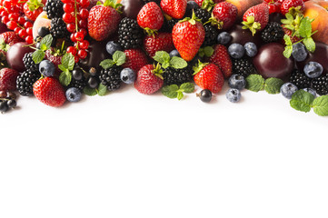 Mix berries isolated on a white. Berries and fruits with copy space for text. Black-blue and red food. Berries at border of image with copy space for text. Background berries. Top view.