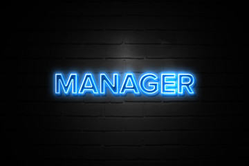 Obraz premium Manager neon Sign on brickwall