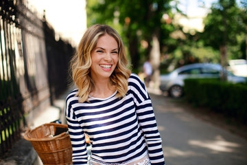 Portrait of a beautiful young woman with a smile