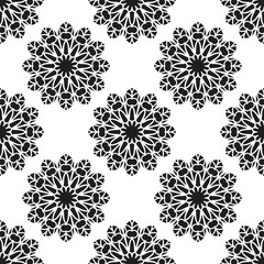 Seamless pattern with abstract flowers. Fashion textile print. Asian fabric background. Vector monochrome design. Perforation floral holes.