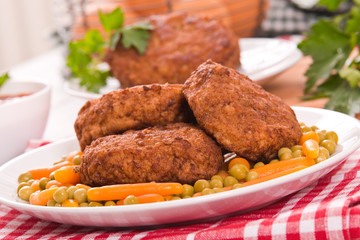 Meatballs on white dish. 