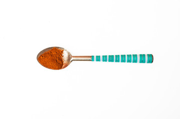 arabic, colorful spoon with spice, isolated on white background
