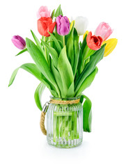 Spring tulips flowers bouquet in glass bucket vase, romantic
