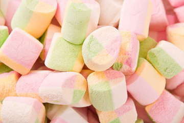 Marshmallows on wooden table. 