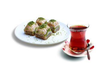 Turkish delights baklava and black tea on a white background