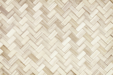 Old bamboo weaving pattern, woven rattan mat texture for background and design art work.