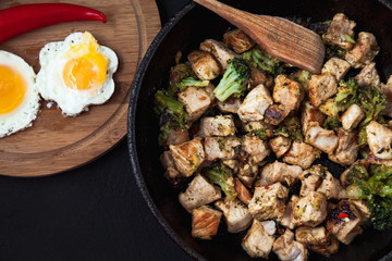 fried beef slices in a frying pan. menu restaurant recipe concept . top view