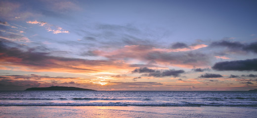 Sunrise above ocean in Rush Ireland
