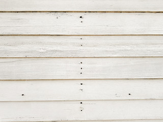 Fototapeta premium White wood floor texture background. plank pattern surface pastel painted wall; gray board grain tabletop above oak timber; tree desk,panel wooden dirty and cracked craft material dry vintage. 