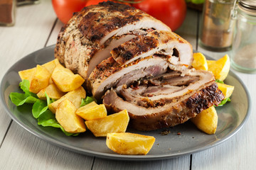 Roasted pork roll stuffed with other meat