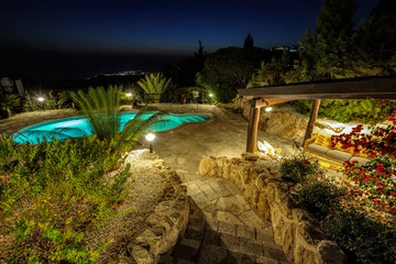 Private swimming pool at night
