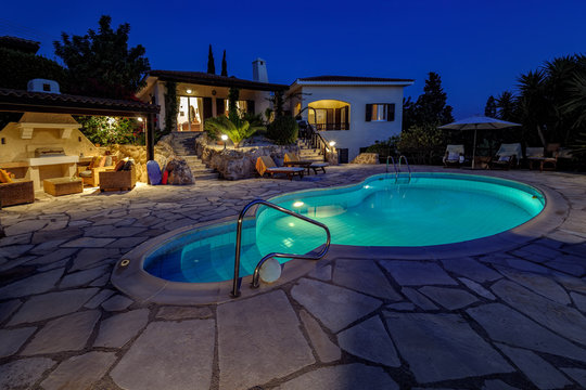 Private swimming pool at night