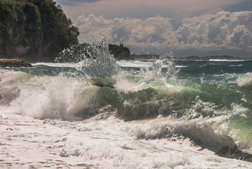 A view of sea or ocean wave splashes look frozen and beautiful.