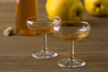 Glasses with homemade quince liqeur