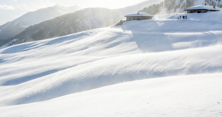 Snowstorm in the mountains at winter time. Mountains of Trentino Alto Adige, South Tyrol