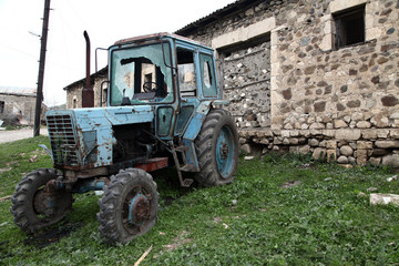  damaged tractor and building