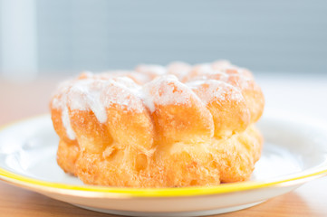 Donut with icing knows in Poland as gniazdko.