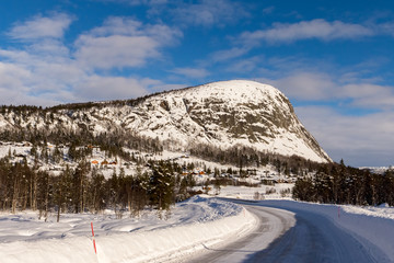 Mountain road in winter, at Loefjell mountain in Setesdal, Norway