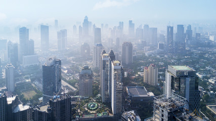 Skyscraper buildings at Jakarta in misty morning