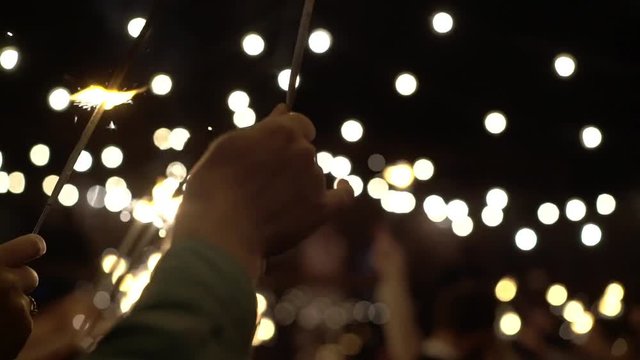 People with sparkles fire slowmotion