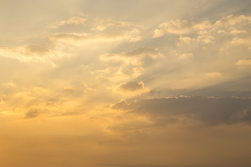 Golden cloud and light golden sky.
