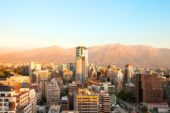 The wealthy neighborhood of Isidora Goyenechea, with El Bosque street and Los Andes Mountain Range in the back, Las Condes district, Santiago, Chile