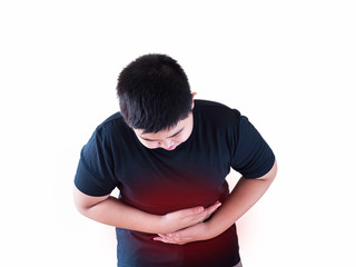 Boy having a stomachache holding his belly tightly with two hands with red pain coloring around his stomach