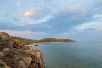 The movement of clouds in the spring in the steppe part of the Crimea peninsula at Cape Opuk.