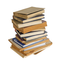 A stack of dusty shabby books on a white background, isolated