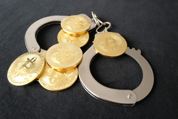 bitcoins et menottes