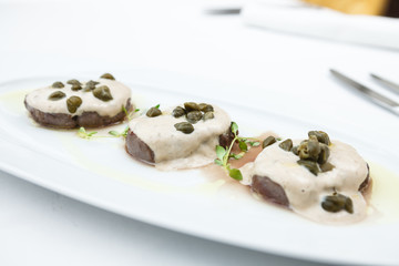 Sliced veal with sauce