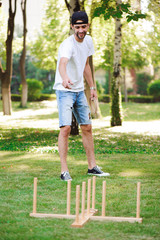 Friends plaing outdoor games - ring toss.