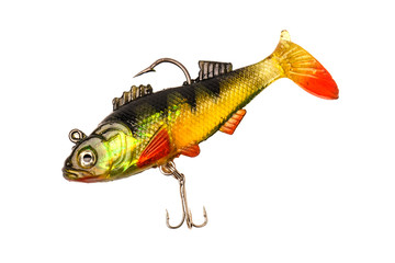 A bait for fishing on a tarpaulin background. Wobblers of different colors.