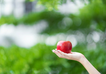 woman with red apple