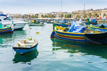 Traditional boats at Marsaxlokk Harbor in Malta