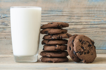Tasty chocolate cookies with glass of milk