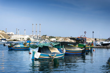Fototapeta premium Mediterranean traditional colorful boats in Malta