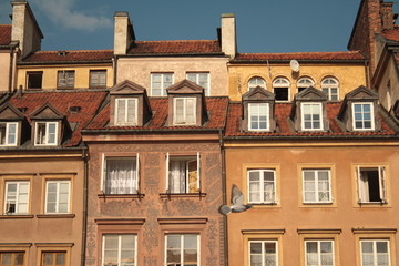 Fototapeta na wymiar Detail of the buildings and windows in castle Square, Warsaw, Poland.